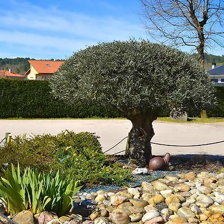 Os Caracoles Отель